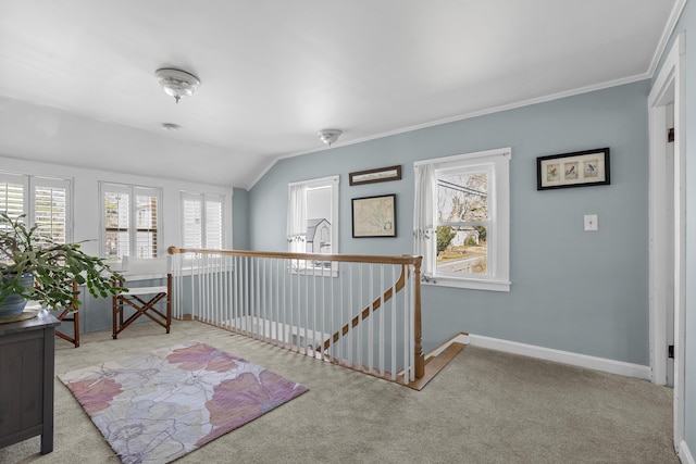 37 Harpswell Islands Rd, Harpswell, ME 04079 - interior space featuring crown molding, an upstairs landing, baseboards, lofted ceiling, and carpet
