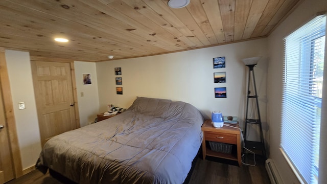 341 E Andover Rd, Andover, ME 04226 - bedroom with crown molding, wooden ceiling, wood finished floors, and a baseboard radiator