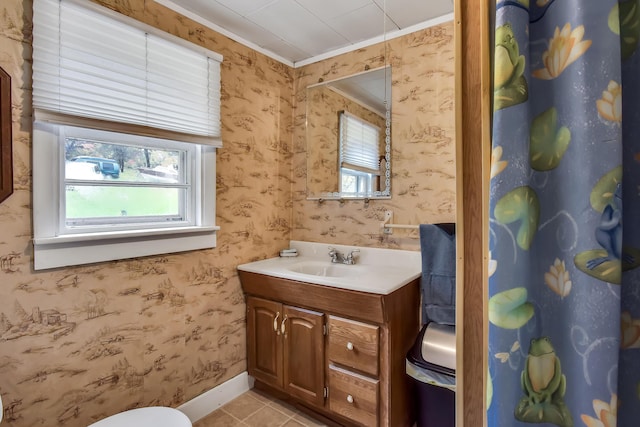 405 Pond Rd, Sidney, ME 04330 - bathroom featuring tile patterned flooring, ornamental molding, vanity, and wallpapered walls