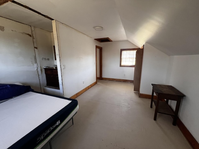 448 Main Rd, Isle Au Haut, ME 04645 - unfurnished bedroom with baseboards, concrete flooring, and lofted ceiling