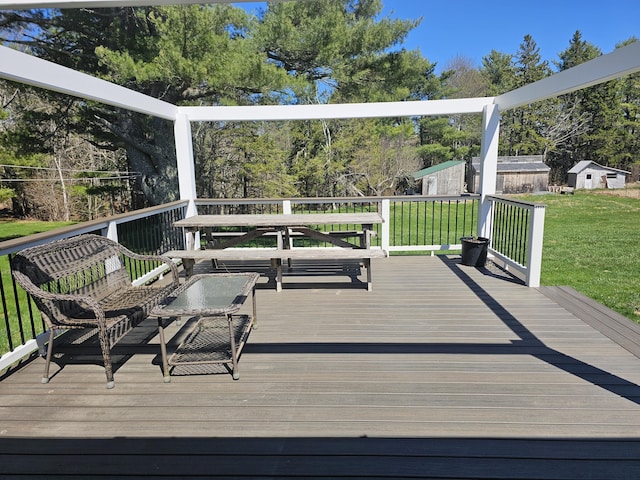 deck featuring a yard