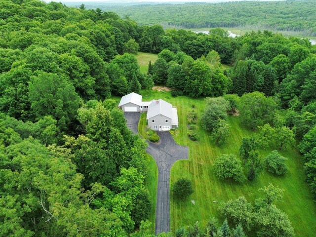 222 Ward Rd, Augusta, ME 04330 - aerial view of property and surrounding area featuring a heavily wooded area