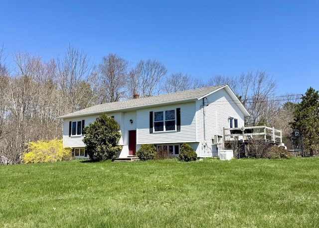 12 Grace Snow Dr, Glenburn, ME 04401 - raised ranch featuring a chimney, a front yard, entry steps, and roof with shingles