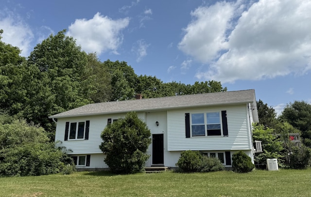 12 Grace Snow Dr, Glenburn, ME 04401 - raised ranch featuring a front lawn and entry steps