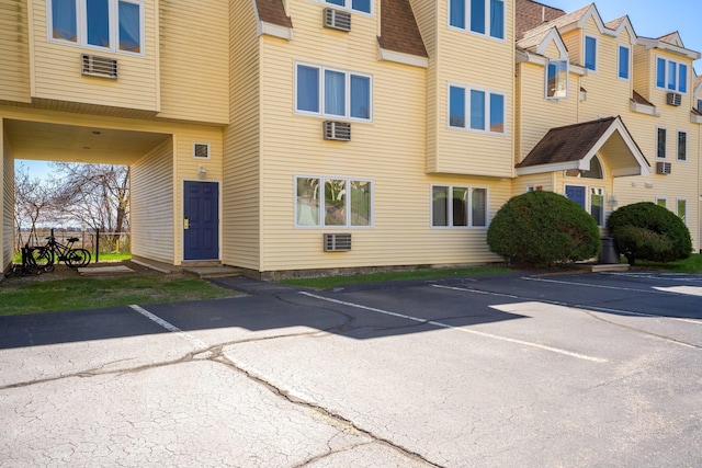1373 Post Rd Unit 4A, Wells, ME 04090 - view of building exterior with uncovered parking