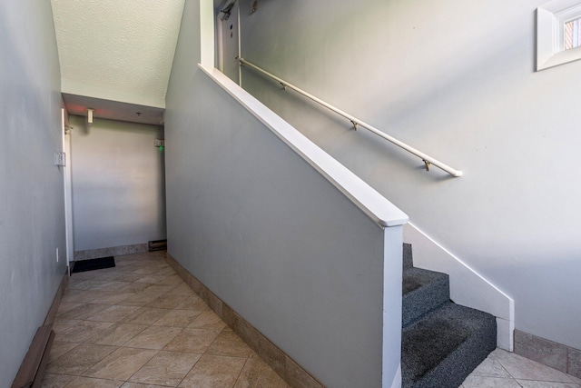 1373 Post Rd Unit 4A, Wells, ME 04090 - stairs featuring baseboards