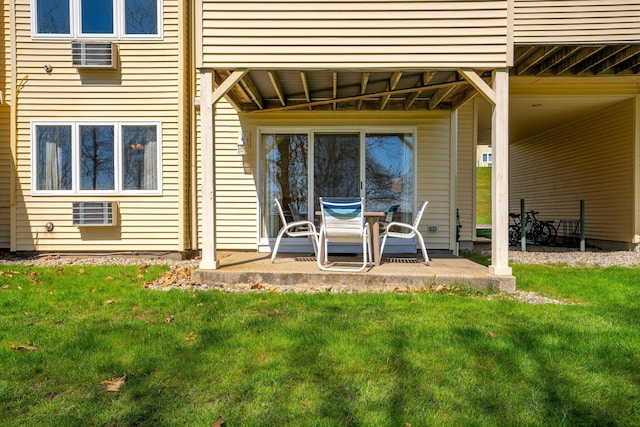 1373 Post Rd Unit 4A, Wells, ME 04090 - rear view of property featuring a patio and a yard