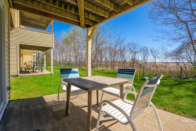 1373 Post Rd Unit 4A, Wells, ME 04090 - view of patio featuring outdoor dining area and a fenced backyard