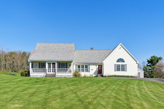61 Pond Rd, Albion, ME 04910 - view of front of house with roof with shingles, a chimney, a porch, and a front yard