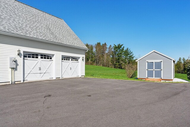 61 Pond Rd, Albion, ME 04910 - garage with a storage shed