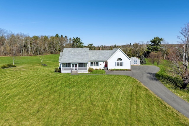 61 Pond Rd, Albion, ME 04910 - view of front of house featuring a porch, driveway, and a front yard