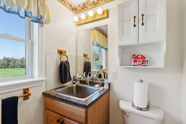 61 Pond Rd, Albion, ME 04910 - bathroom with toilet and vanity