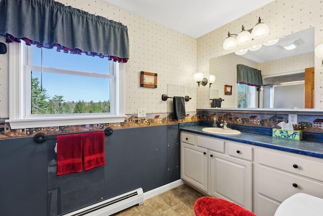 61 Pond Rd, Albion, ME 04910 - bathroom featuring an enclosed shower, vanity, baseboard heating, and wallpapered walls