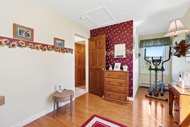 61 Pond Rd, Albion, ME 04910 - interior space with baseboards, attic access, light wood-type flooring, and a baseboard heating unit