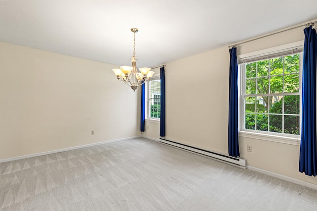 161 Saco Ave Unit 404, Old Orchard Beach, ME 04064 - carpeted empty room with a baseboard radiator, a chandelier, plenty of natural light, and baseboards