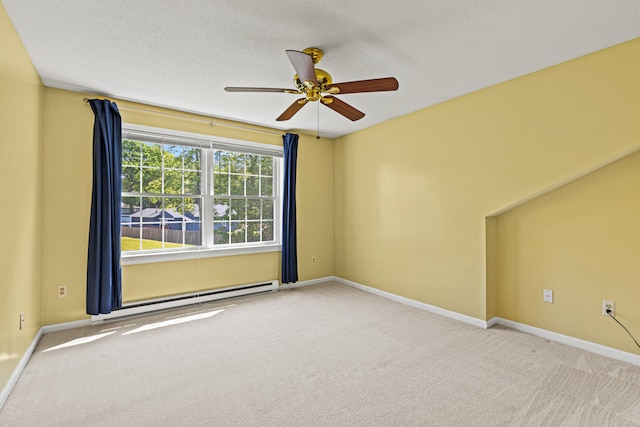 161 Saco Ave Unit 404, Old Orchard Beach, ME 04064 - carpeted spare room featuring ceiling fan, a baseboard radiator, and baseboards