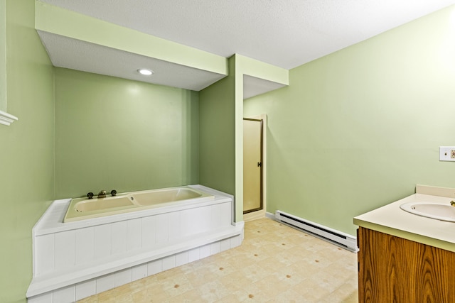 161 Saco Ave Unit 404, Old Orchard Beach, ME 04064 - full bath featuring a baseboard radiator, a garden tub, a shower stall, vanity, and tile patterned floors