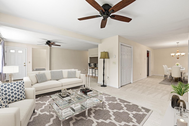 161 Saco Ave Unit 404, Old Orchard Beach, ME 04064 - living area featuring a ceiling fan, a chandelier, carpet floors, and baseboards
