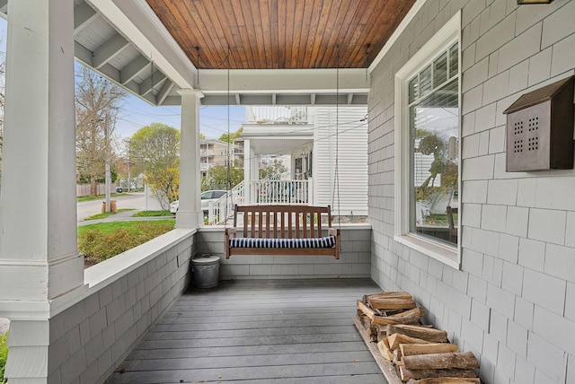 14 Codman St, Portland, ME 04103 - deck featuring covered porch