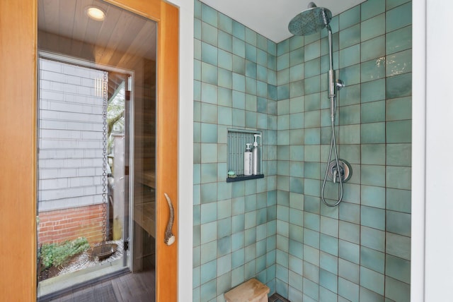 14 Codman St, Portland, ME 04103 - bathroom featuring tiled shower and wood finished floors