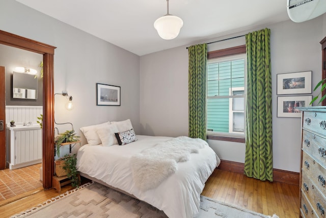 14 Codman St, Portland, ME 04103 - bedroom featuring wood-type flooring and baseboards