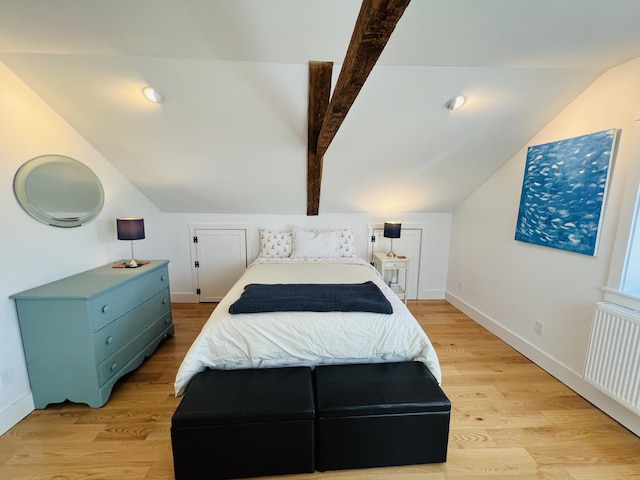 157 Ellsworth Rd, Blue Hill, ME 04614 - bedroom with light wood-style flooring and radiator heating unit