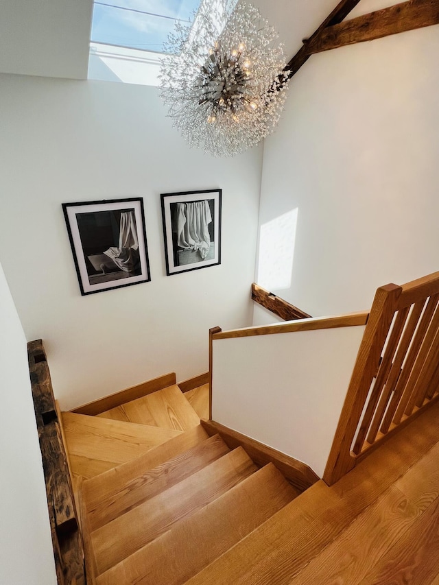 157 Ellsworth Rd, Blue Hill, ME 04614 - staircase with a chandelier