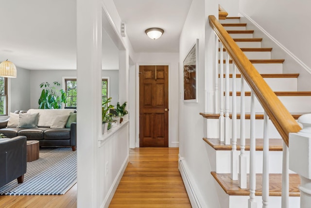 26 Hunts Point Rd, Cape Elizabeth, ME 04107 - foyer entrance with light wood-type flooring, stairs, and baseboards
