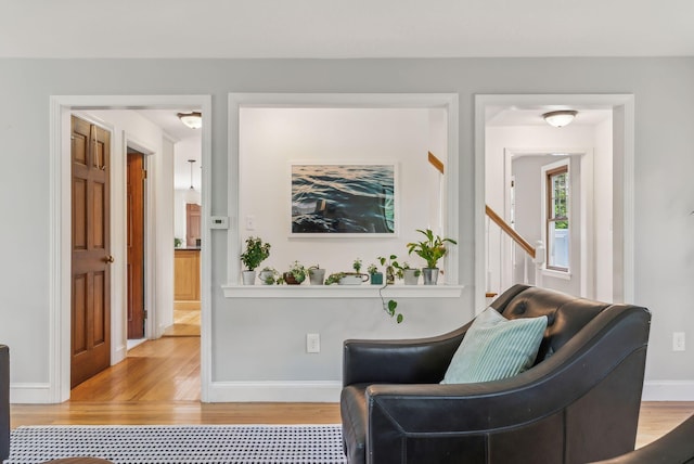 26 Hunts Point Rd, Cape Elizabeth, ME 04107 - sitting room featuring light wood finished floors and baseboards