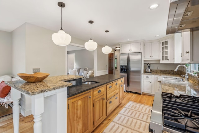 26 Hunts Point Rd, Cape Elizabeth, ME 04107 - kitchen featuring stainless steel fridge, a sink, light wood-style flooring, and recessed lighting