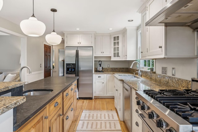 26 Hunts Point Rd, Cape Elizabeth, ME 04107 - kitchen featuring appliances with stainless steel finishes, a sink, under cabinet range hood, hanging light fixtures, and recessed lighting