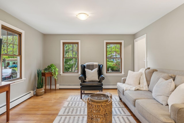 26 Hunts Point Rd, Cape Elizabeth, ME 04107 - living area with a baseboard heating unit and plenty of natural light