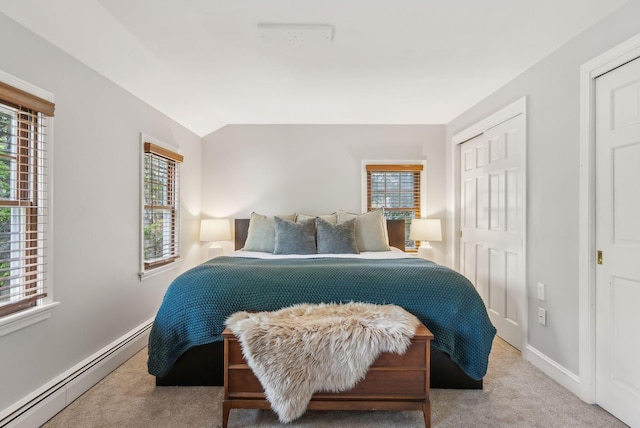 26 Hunts Point Rd, Cape Elizabeth, ME 04107 - bedroom featuring baseboard heating, carpet, a closet, baseboards, and lofted ceiling