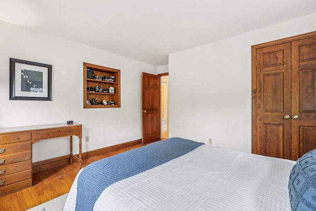 26 Hunts Point Rd, Cape Elizabeth, ME 04107 - bedroom with wood finished floors and baseboards