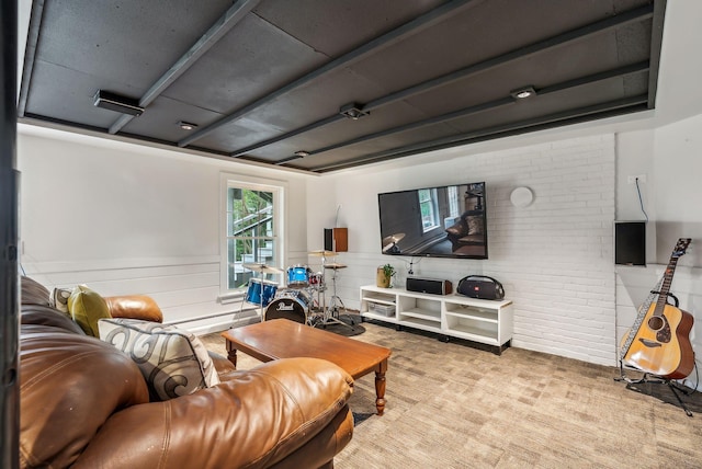 26 Hunts Point Rd, Cape Elizabeth, ME 04107 - living area featuring a wainscoted wall and brick wall