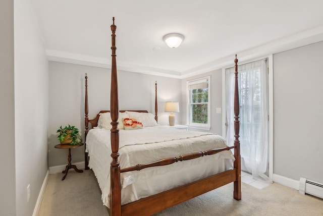 26 Hunts Point Rd, Cape Elizabeth, ME 04107 - carpeted bedroom with a baseboard radiator, baseboards, and access to exterior