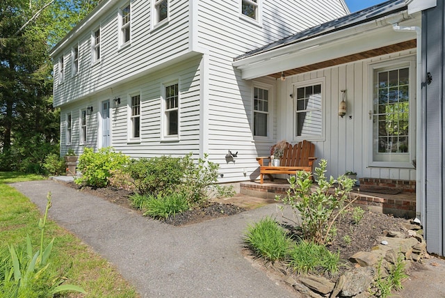 26 Hunts Point Rd, Cape Elizabeth, ME 04107 - view of exterior entry featuring board and batten siding