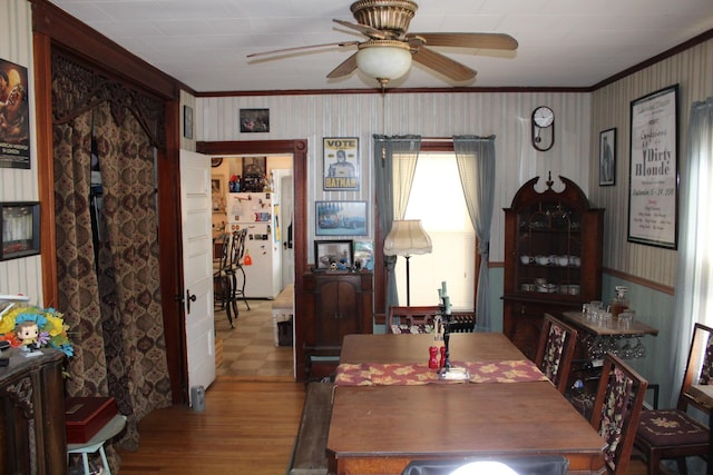 13 Halde St, Waterville, ME 04901 - dining room featuring crown molding, ceiling fan, and wood finished floors