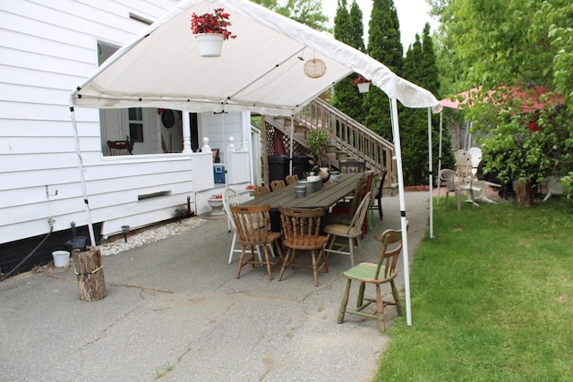 13 Halde St, Waterville, ME 04901 - view of patio / terrace with outdoor dining area and stairway
