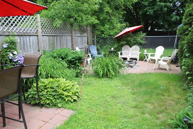 13 Halde St, Waterville, ME 04901 - view of yard featuring a patio area