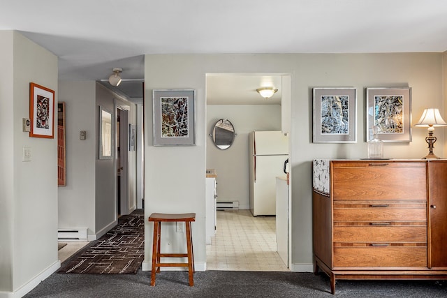47 Bay View St, Camden, ME 04843 - corridor featuring a baseboard heating unit and baseboards