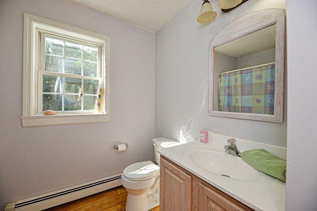 16 Dragonfly Ln, Kennebunkport, ME 04046 - bathroom featuring baseboard heating, toilet, vanity, and a shower with curtain