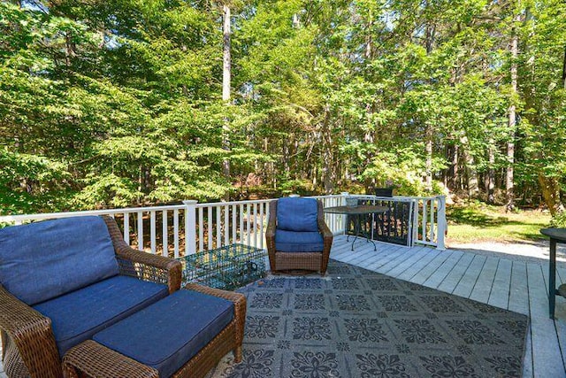 16 Dragonfly Ln, Kennebunkport, ME 04046 - wooden deck with a wooded view