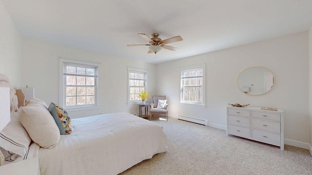 12 Summit Ter, Falmouth, ME 04105 - bedroom with baseboards, a ceiling fan, baseboard heating, and light carpet