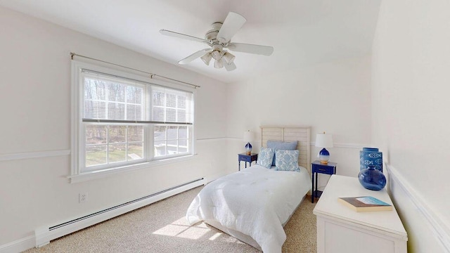 12 Summit Ter, Falmouth, ME 04105 - bedroom with a baseboard heating unit, multiple windows, and light carpet