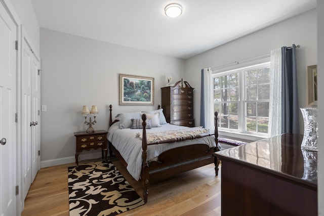 3 Flagship Cir, Kennebunk, ME 04043 - bedroom with light wood-style floors and baseboards