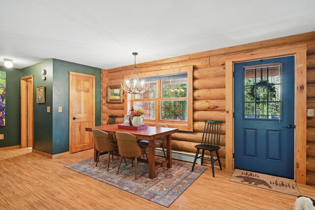 370 Point Rd, Belgrade, ME 04917 - dining space featuring plenty of natural light, rustic walls, and wood finished floors