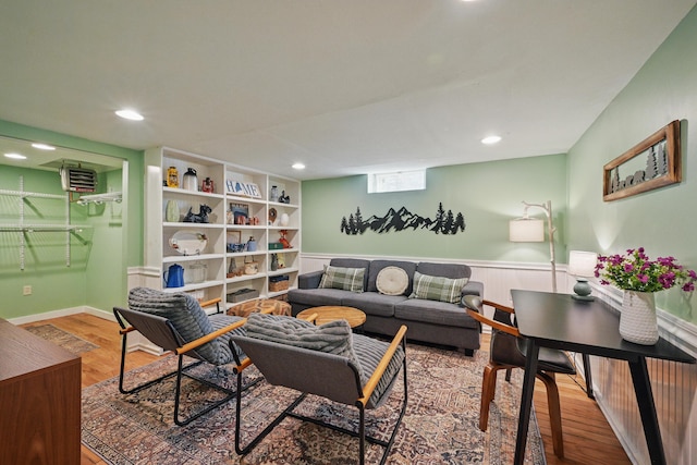 370 Point Rd, Belgrade, ME 04917 - living room featuring recessed lighting, wood finished floors, and a wainscoted wall