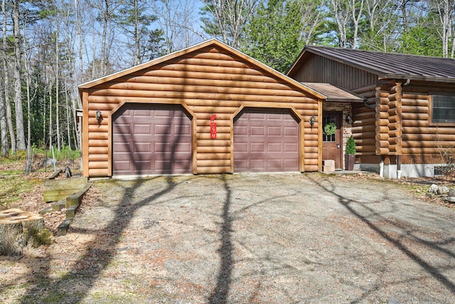 370 Point Rd, Belgrade, ME 04917 - garage featuring driveway