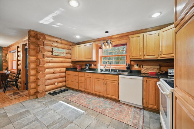 370 Point Rd, Belgrade, ME 04917 - kitchen with pendant lighting, dark countertops, a sink, log walls, and white appliances